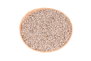 Full wicker basket with sunflower seeds.