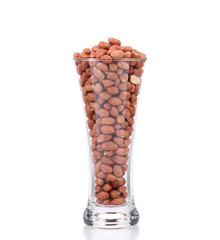 Glass full with peanuts.