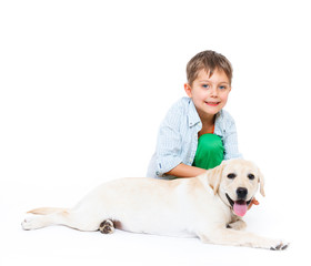 Cute little boy with his labrador