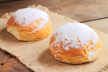 Fototapeta na wymiar Powdered sugar sweet buns