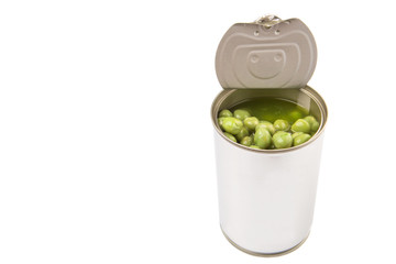 Green peas in a tin can over white background 