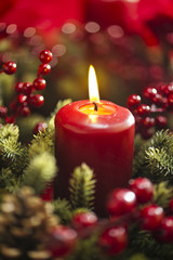 Fototapeta na wymiar Advent wreath over red background
