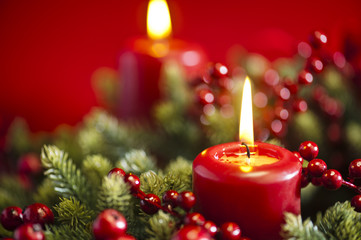 Advent wreath over red background