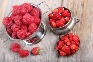 Raspberries and strawberries.