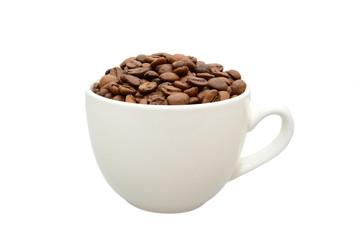 white cup with coffee beans