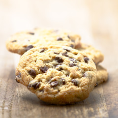 Chocolate cookies on a wood board.