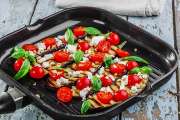 grilled eggplant with feta cheese and cherry tomatoes