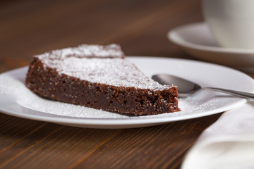 Fototapeta na wymiar Chocolate Cake Slice on white dish