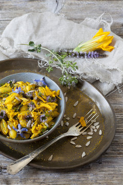 yellow summer flowers pasta with seeds and petals flowers