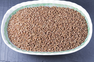 Buckwheat in oval bowl