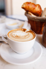 cappuccino with croissants