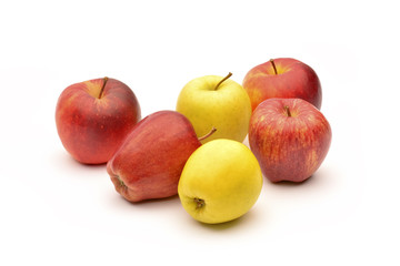 Yellow and red apples on white background