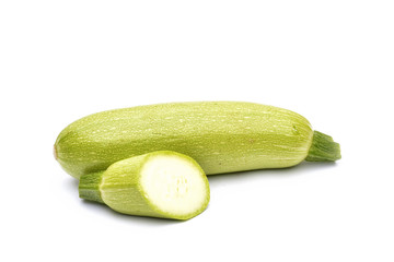 Pair of fresh green zucchini on white background