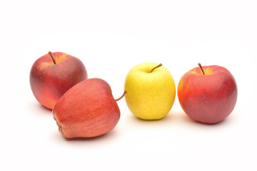 Yellow and red apples on white background
