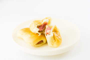 Sausage in buns on white background