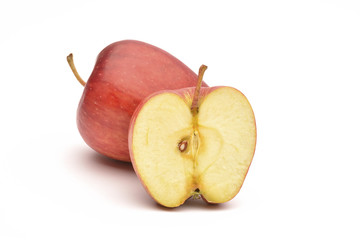 Apple and slice on a white background