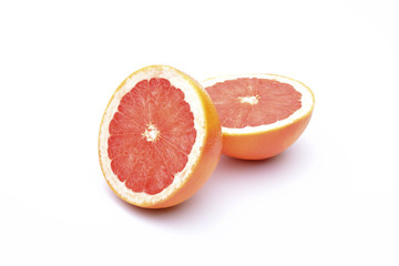 Grapefruit slices on white background