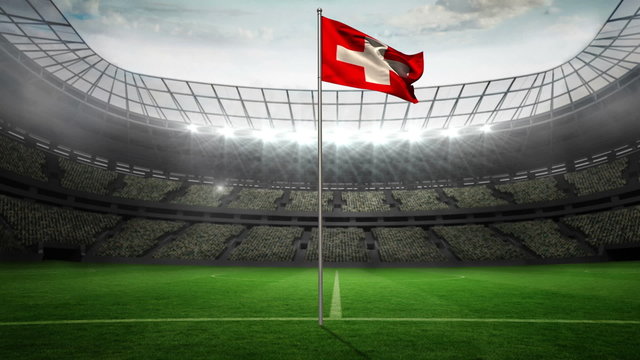 Switzerland national flag waving on flagpole
