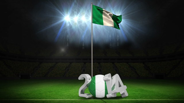 Nigeria national flag waving on football pitch with message