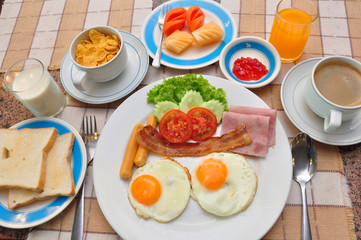set of american breakfast on table.