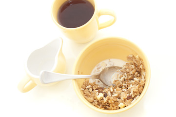 Bowl of muesli and coffee for breakfast