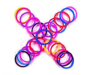 Colorful rubber band multiply symbol.