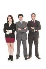 two businessmen and a businesswoman in suits posing