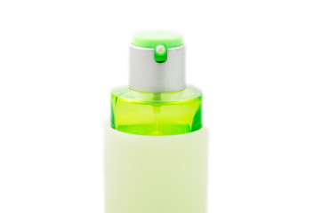 green perfume bottle isolated.