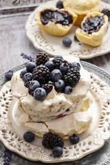 Pavlova cake with blueberries and blackberries