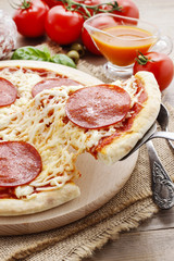 Italian cuisine: pizza with salami