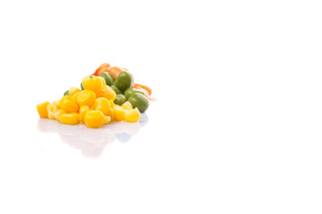 A group of baked beans, green peas and sweet corn over white 