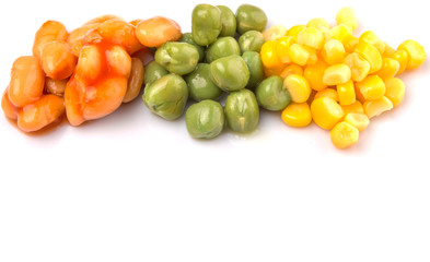 A group of baked beans, green peas and sweet corn over white 