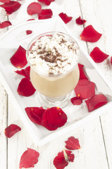 cold ice coffee in a glass on a tray