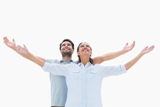 Cute Couple Standing With Arms Out