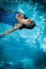 Woman swimming, pool
