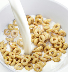 Cereal Bowl With Milk Pouring