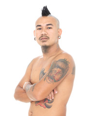 punk guy with mohawk hair style, piercing and tattoo