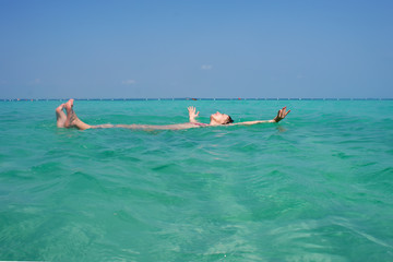 woman enjoy swimming in the sea