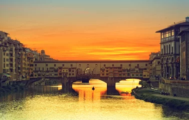 Wall murals Ponte Vecchio View of Gold (Ponte Vecchio) Bridge in Florence on a sunset