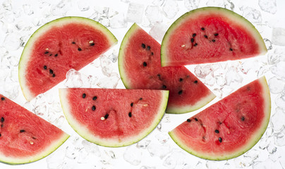 slices of water melon on ice