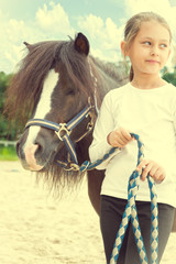 Obraz premium child and horse