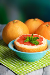 Ripe grapefruits in bowl