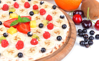 Sweet pizza with fruits close-up