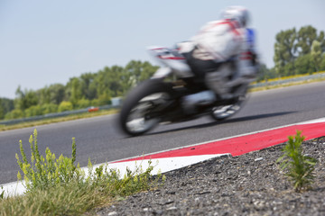 Motorcycle racer on circuit
