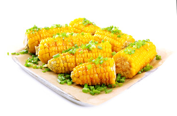 Grilled corn cobs, isolated on white