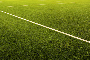 Obraz premium Green football field grass.Texture