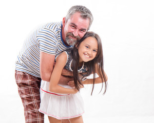 Caucasian dad hugging asian daughter