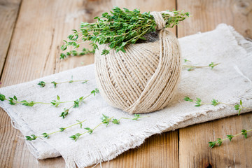 bundle of fresh thyme on sackcloth