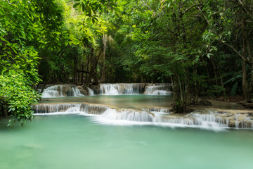 Naklejka premium Small waterfall in forest
