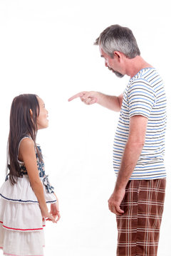 Dad scolding naughty daughter